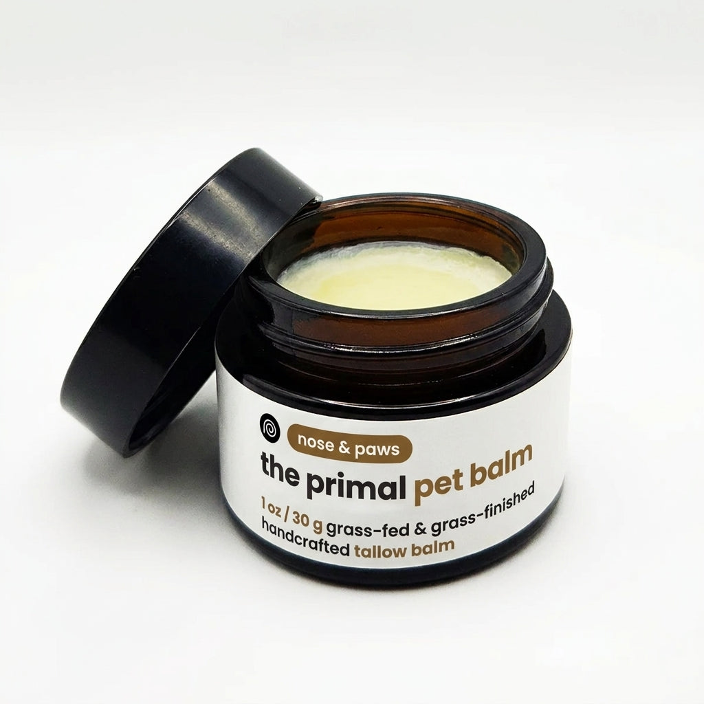 Tallow paw and nose balm for dogs and cats in an amber glass jar by The Primal
