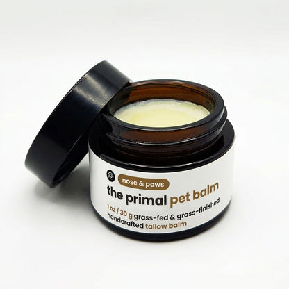 Tallow paw and nose balm for dogs and cats in an amber glass jar by The Primal