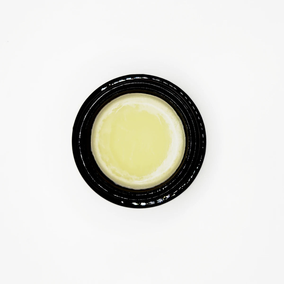 Unscented tallow paw balm for dogs and cats, top view of the open jar
