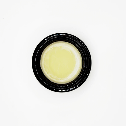Unscented tallow paw balm for dogs and cats, top view of the open jar